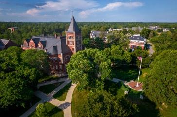 Aerial shot of UNH campus in summer, with T Hall in center