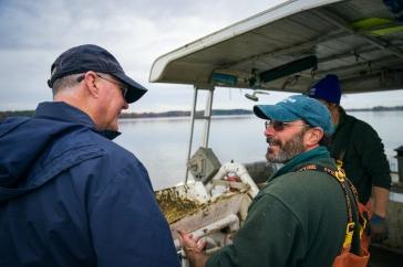 President Dean speaks to Brian Gennaco, who started Virgin Oyster Co.