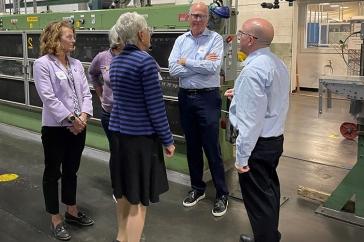 UNH leaders tour SubCom facility