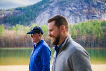 UNH President Jim Dean walks near Echo Lake