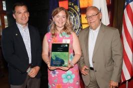 Abigail Lyon receives award plaque from Gulf of Maine Council.